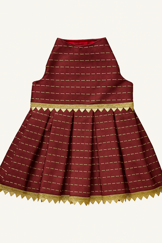 Cute small dog in maroon ethnic lehenga dress with gold details – perfect for weddings and festivals