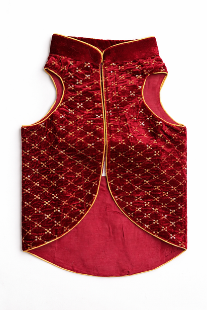 Red dog vest with gold embroidery on a white background