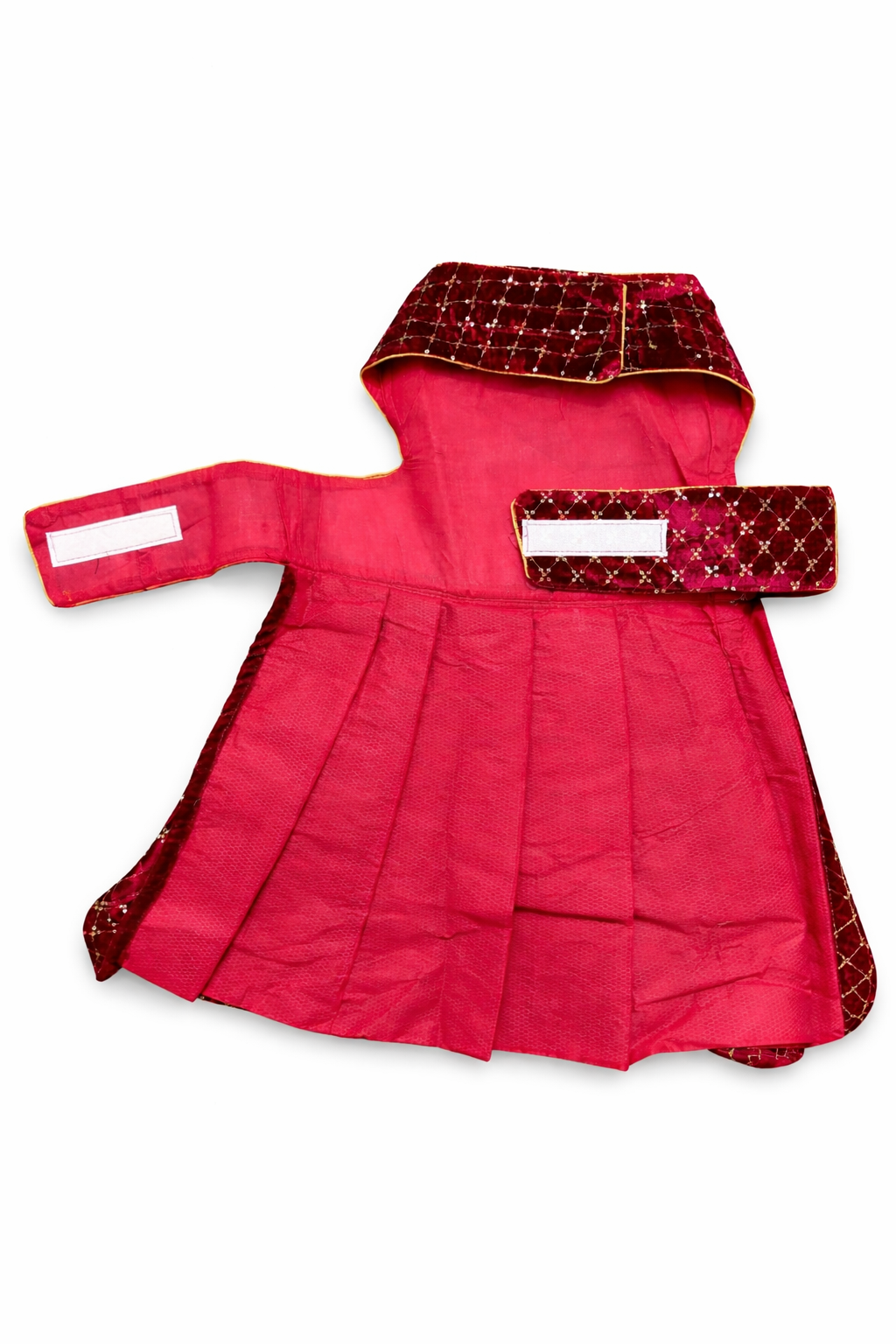 Red traditional outfit with gold patterns on a white background