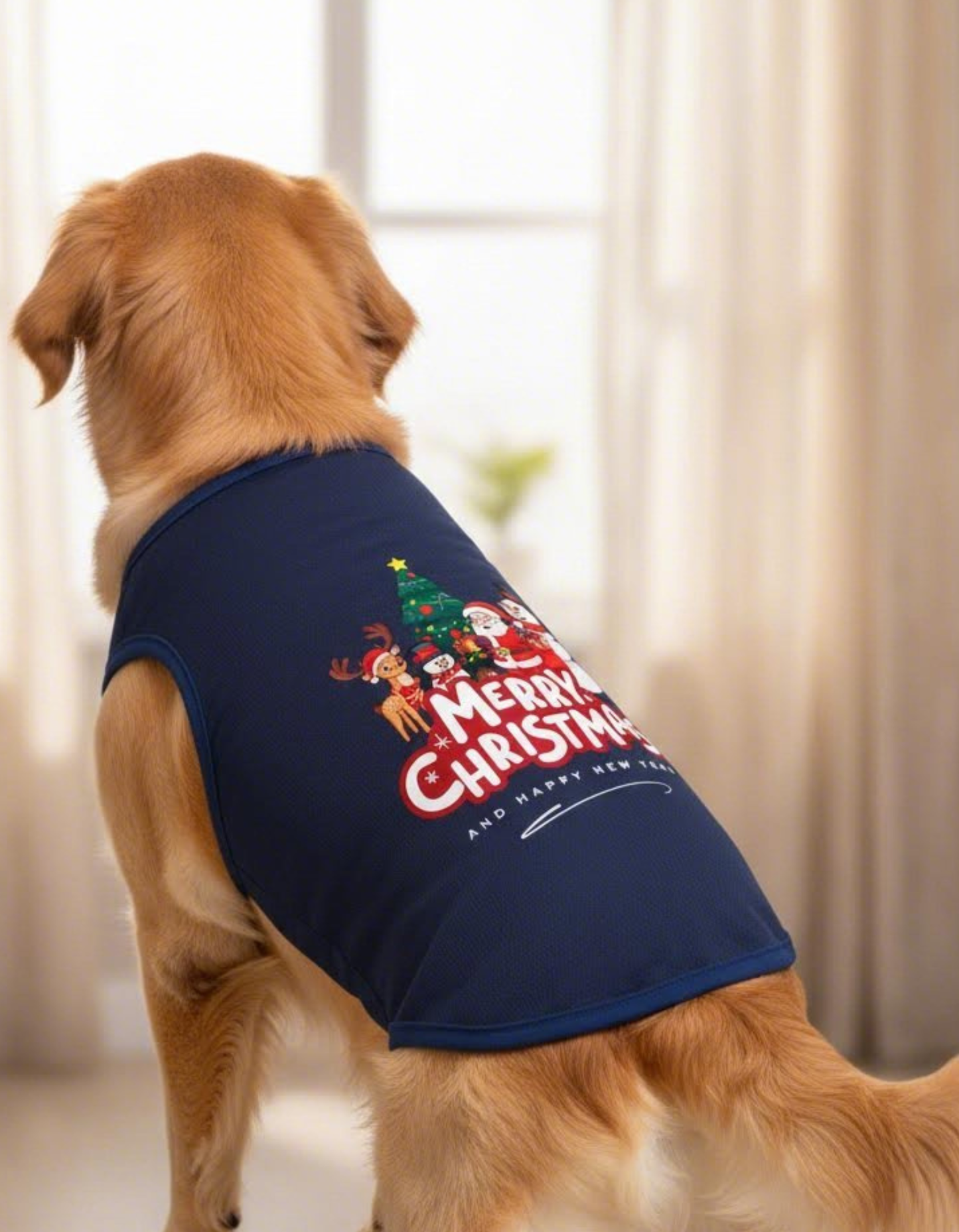 Dog wearing a navy blue Christmas-themed shirt with a tree and reindeer design.